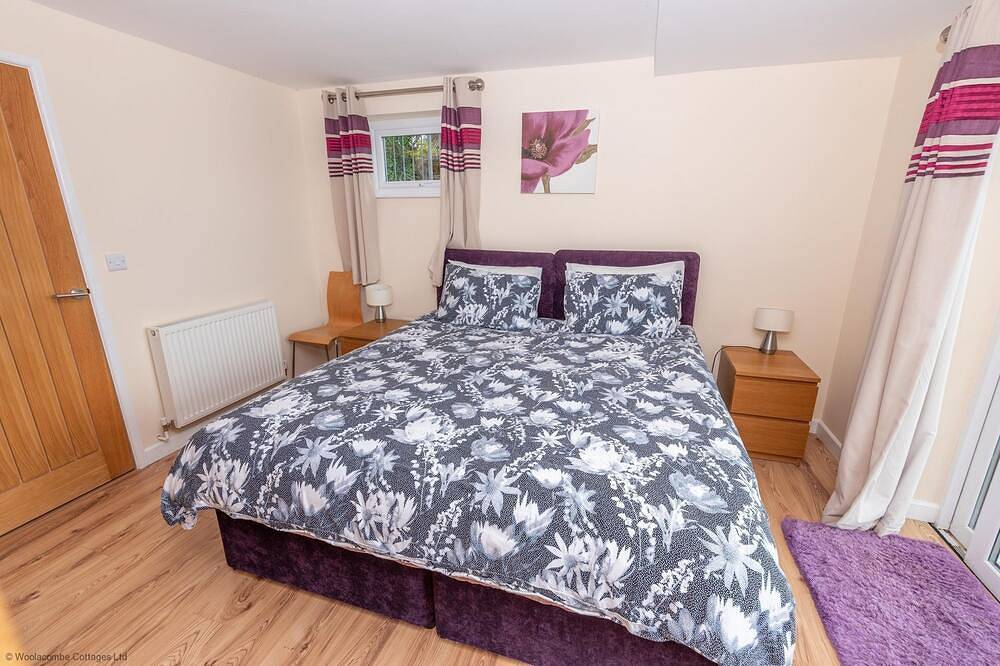 Entire apartment, The focal room of this light and airy property is the open plan living area with patio doors leading in Woolacombe, Devon