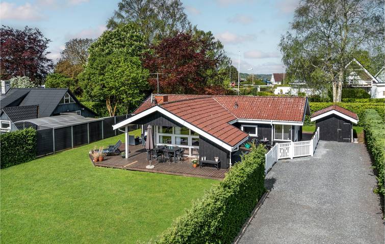 Ferienhaus für 6 Personen, mit Terrasse und Whirlpool sowie Garten und Sauna in Hejlsminde