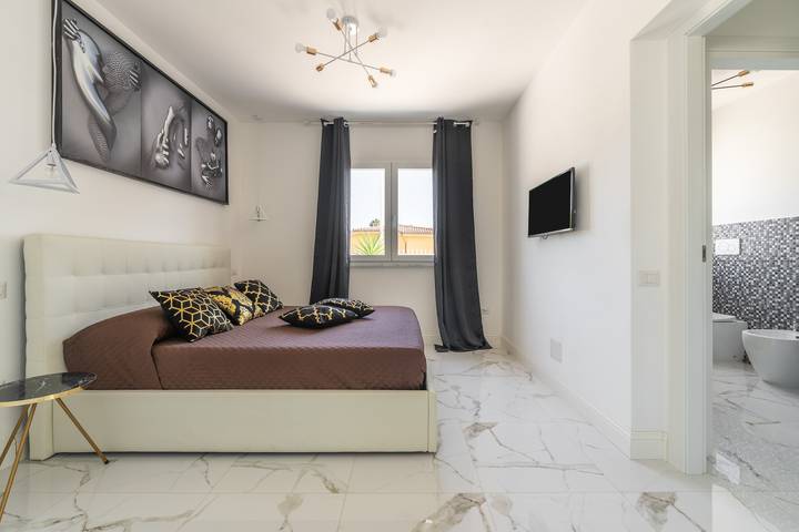 Holiday Home 'Villa Leon with Private Pool' with Sea View, Wi-Fi and Air Conditioning in Foxi, Quartu Sant'Elena