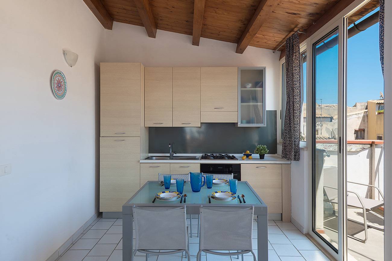 Appartamento intero, Aretusa Apartment with Terrace by Wonderful Italy in Spiaggetta di Cala Rossa, Siracusa