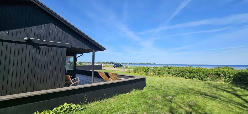 Ferienhaus für 7 Personen, mit Seeblick und Garten sowie Ausblick