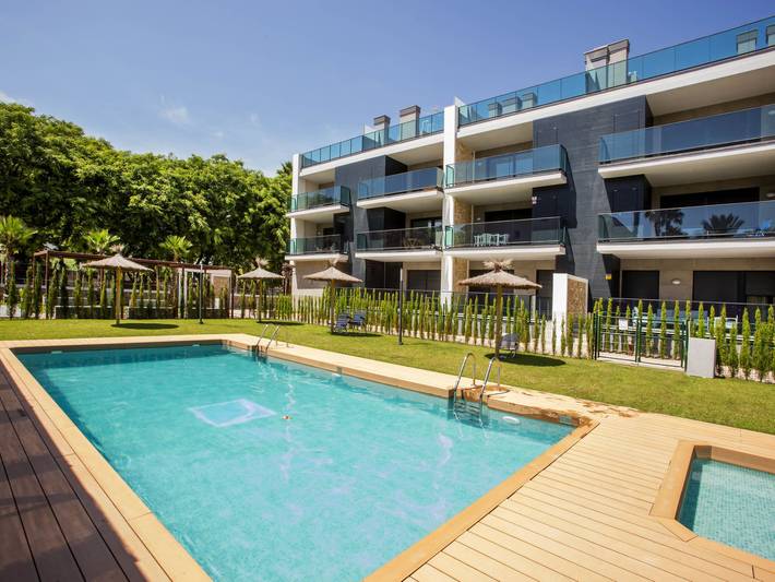 Location de vacances pour 4 personnes, avec terrasse ainsi que bassin pour enfant et jardin à Playa del Arenal