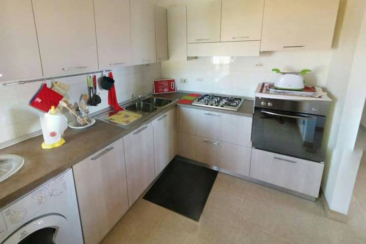 Appartement entier, Appartement de vacances pour 4 personnes avec jardin in Maddalena Spiaggia, Capoterra