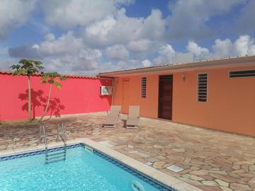 Maison d’hôte pour 2 personnes, avec terrasse et piscine ainsi que vue et jardin dans Guyane française