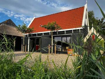 Ferienhaus für 4 Personen, mit Garten und Ausblick sowie Seeblick in Nordholland