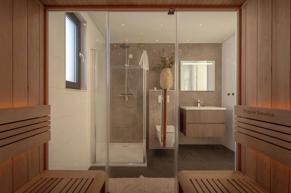 Luxuriöse Wellnessvilla für 4 Personen auf dem Anwesen Vogelenzang mit privater Sauna. Hell, komfortabel und nachhaltig eingerichtet, umgeben von Grün und in unmittelbarer Nähe zu den Dünen und der Küste. in Niederländische Nordsee