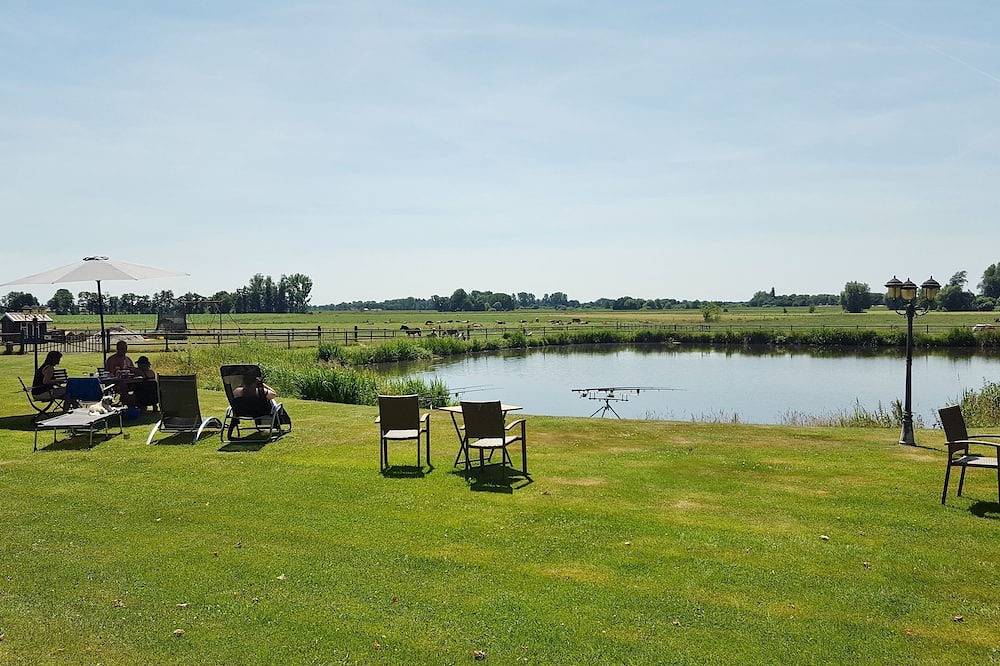 Ganze Wohnung, Karpfenhütte - Ferienhof Am Birkensee 55125 in Detern, Ostfriesland