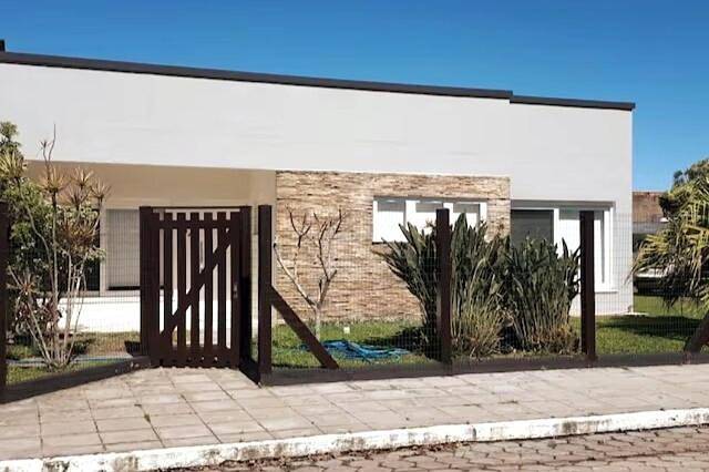 Casas e apartamentos de temporada para 8 pessoas, com piscina e jardim em Xangri-lá