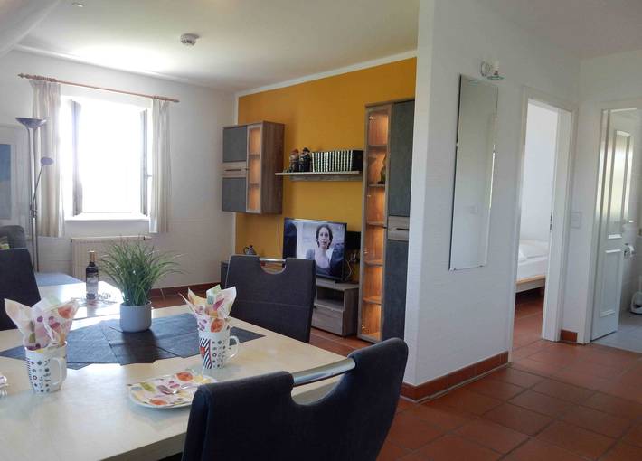 Ferienwohnung für 4 Personen, mit Balkon und Garten sowie Pool und Sauna