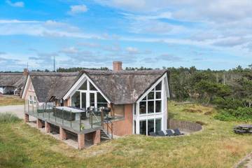Ferienhaus mit Meerblick für 12 Personen, mit Terrasse und Pool sowie Sauna und Whirlpool in Blavand