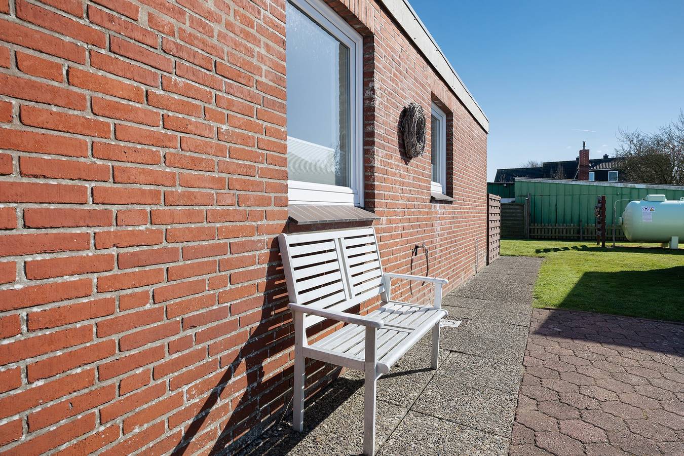 Studio entier, Studio 'Ferienwohnung Friesenkoje' avec terrasse privée, jardin partagé et Wi-Fi in Nordstrand (Municipality), Nordseeküste