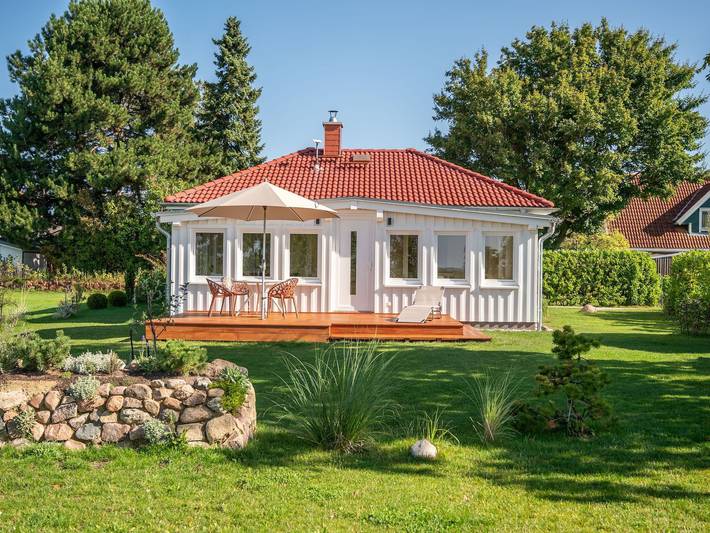 Bungalow für 4 Personen, mit Terrasse und Garten sowie Seeblick und Ausblick in Born am Darß