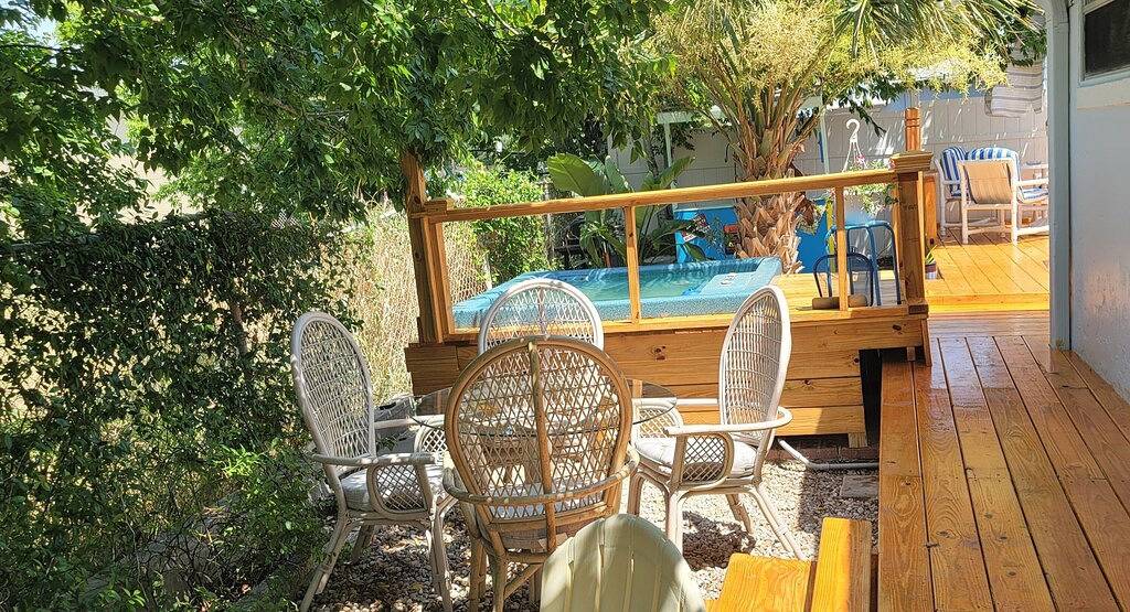 Good Times! Beach cottage with hot tub, walk to beach! Unique amenities! in Daytona Beach, Florida