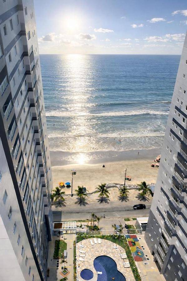 Casas e apartamentos de temporada para 6 pessoas, com piscina e piscina infantil e ainda jardim em Mongaguá