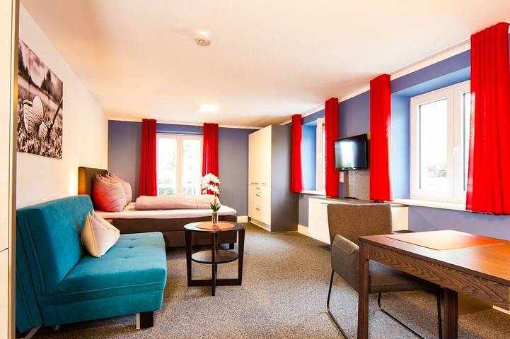 Ferienwohnung für 4 Personen, mit Balkon und Garten in Münnerstadt