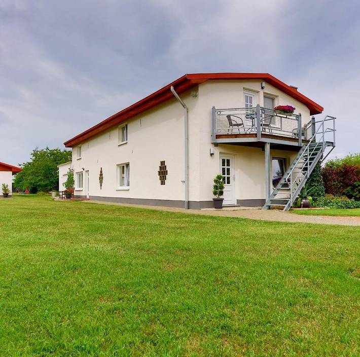 Ferienwohnung für 3 Personen, mit Balkon und Terrasse sowie Garten
