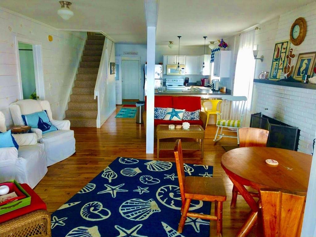 New Listing! Lake front cottage with 100' of private sandy beach in Prudenville, Roscommon County