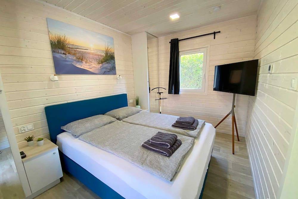Wassermann vacation home with box-spring beds and large terrace in Wunstorf, Steinhuder Meer