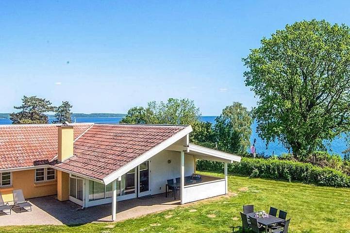 Ferienhaus für 10 Personen, mit Whirlpool und Terrasse sowie Garten und Sauna in Mørkholt