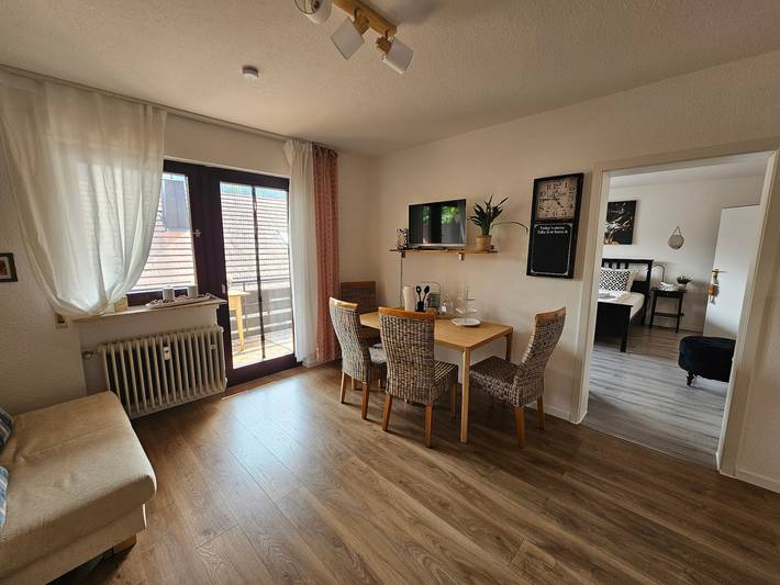 Ferienwohnung für 3 Personen, mit Balkon und Garten sowie Seeblick