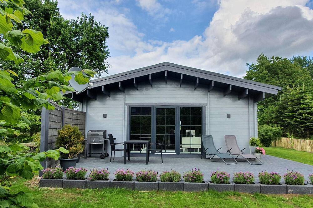 Idyllisches Blockbohlenhaus mit eigenem Garten und Sauna zum Wohlfühlen in Martensrade, Südliche Ostseeküste