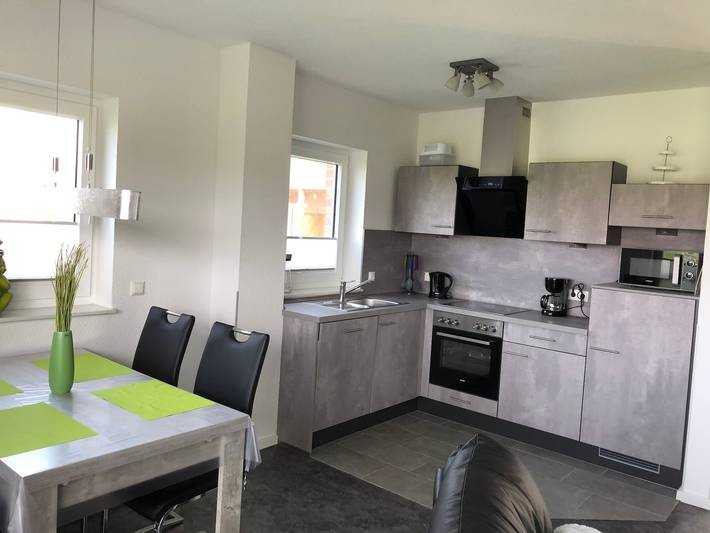 Ferienhaus mit Meerblick für 4 Personen, mit Balkon und Terrasse sowie Garten und Sauna am Jadebusen - 4