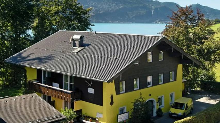 Vakantiewoning voor 3 personen, with terras and zwembad as well as tuin aan de Wolfgangsee