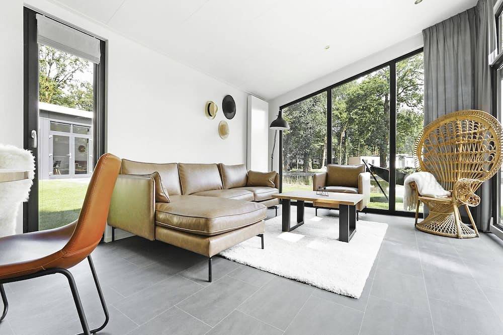Bos Lodge met heerlijke tuin in Markelo, Twente