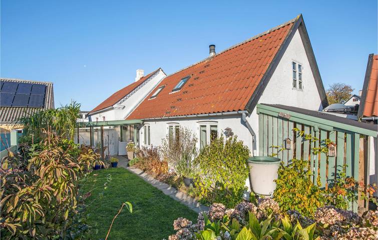 Ferienhaus für 4 Personen, mit Terrasse und Garten