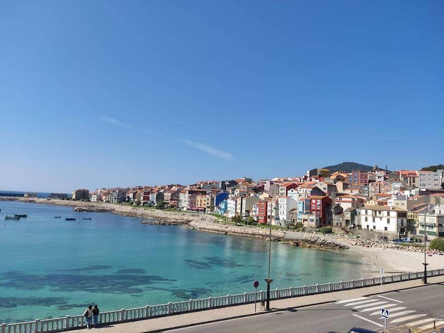 Apartamento inteiro, Acogedor piso en primera línea de mar- 8 huéspedes in Praia do Carreiro (A Guarda), A Guarda