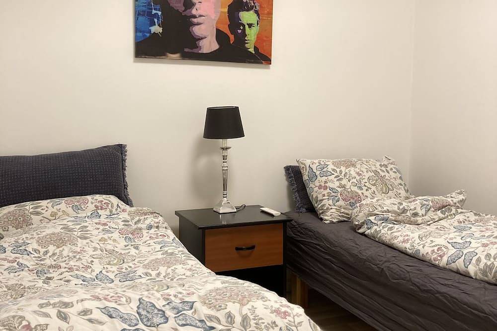 Et Koselig og Sentralt Townhouse med en Idyllisk Lille Hage for 2-5 Pers in Kristiansand