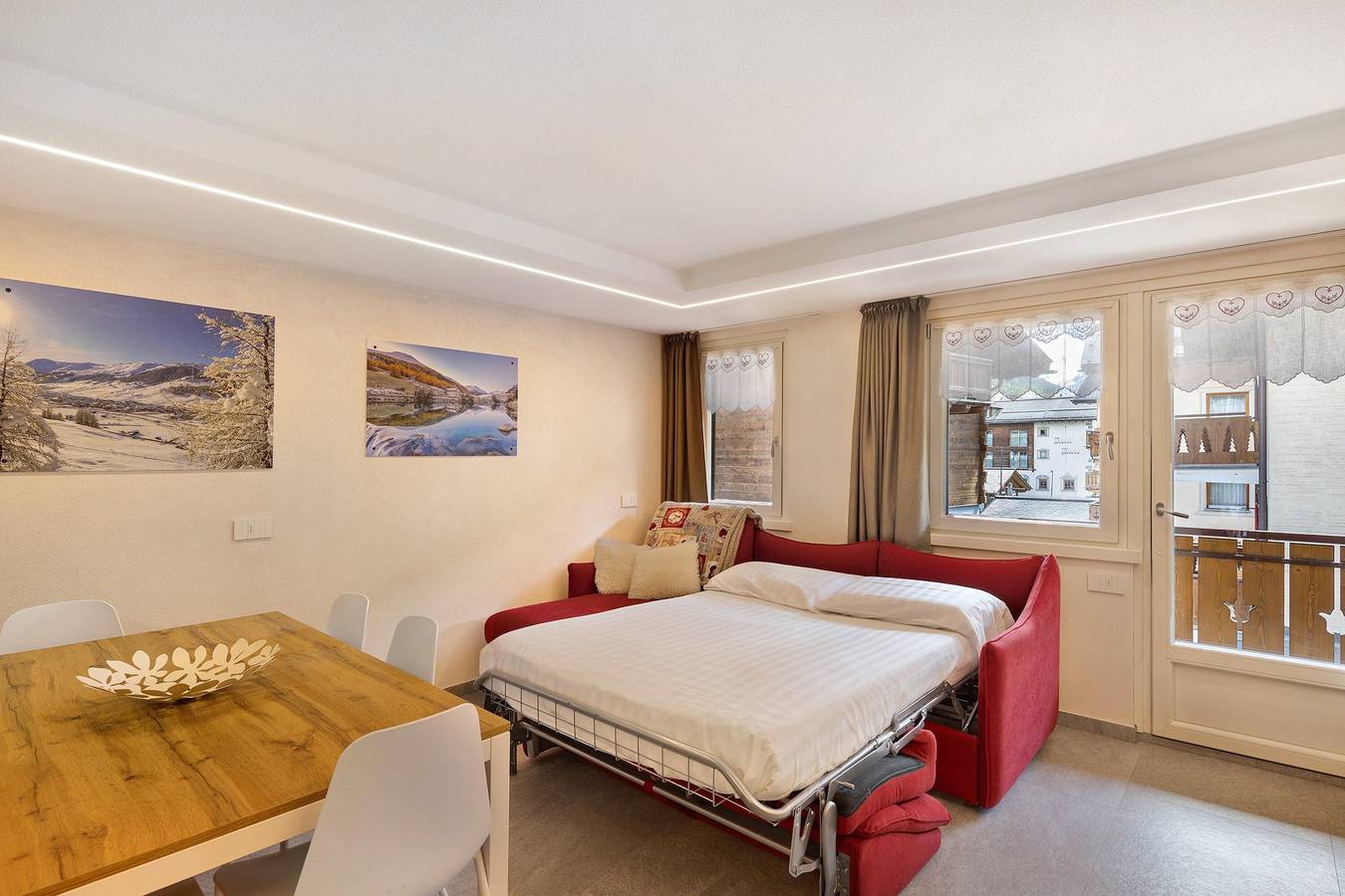 Appartement entier, Appartement 'A Due Passi Rosso' avec vue sur les montagnes, balcon et Wi-Fi in Livigno (Town), Livigno
