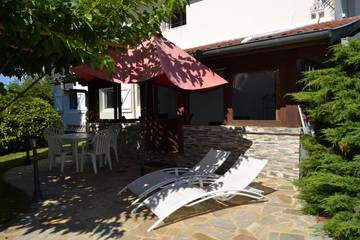 Maison de vacances pour 4 personnes, avec jardin et piscine à Saint-Martin-de-Seignanx