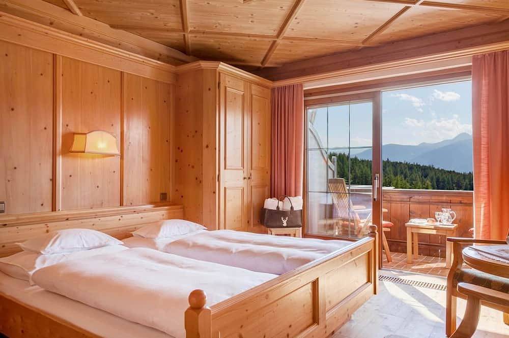 Doppelzimmer I mit Südbalkon inklusive Frühstück - Hotel Garni Lärchenhof Natur in Mösern, Telfs
