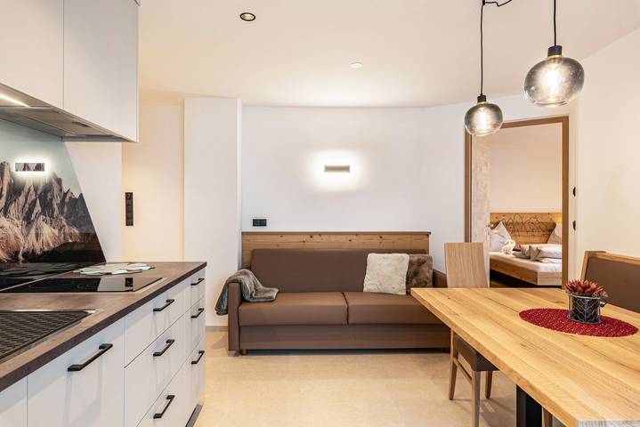 Appartamento "Planerhof Lilie" con vista montagna, terrazza comune e Wi-Fi in Pardell, Funes