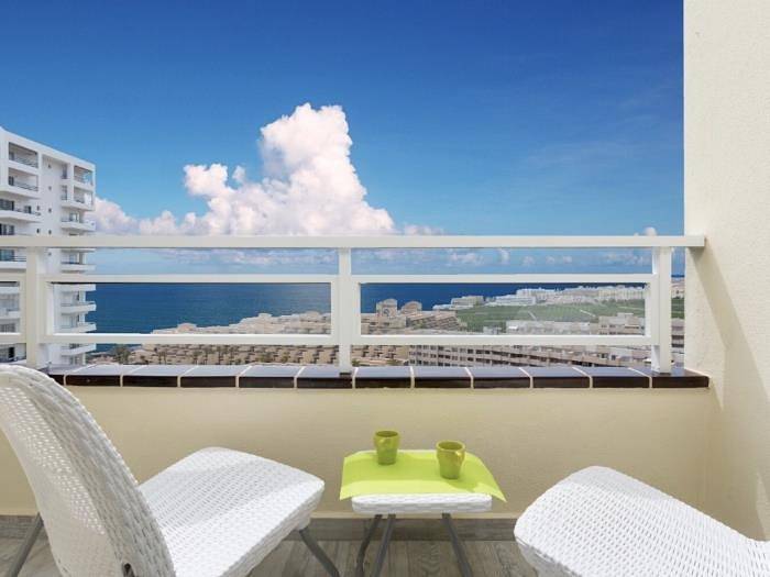 Appartement de vacances pour 6 personnes, avec Vue sur l’océan ainsi que Balcon et Piscine