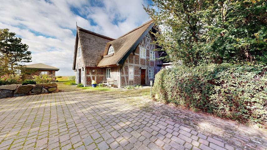 Luxus-Ferienhaus für 4 Personen, mit Balkon und Terrasse sowie Garten und Sauna in Mönchgut