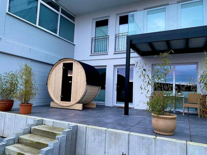 Ferienwohnung für 2 Personen, mit Terrasse und Garten sowie Sauna und Seeblick