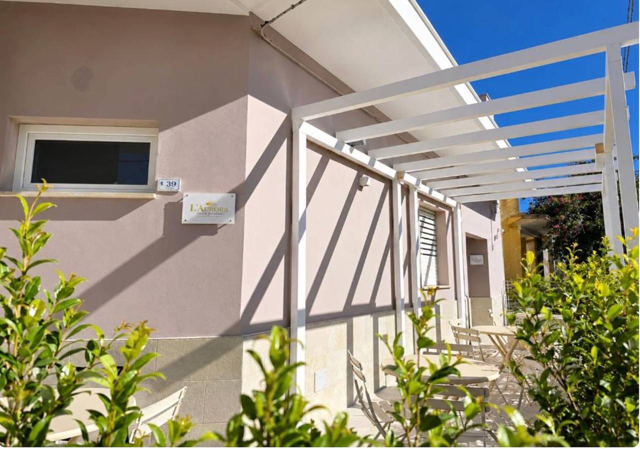 Appartement entier, Appartement 'L'Aurora B&B - Suite Tramonto' avec terrasse partagée, Wi-Fi et climatisation in Ugento, Golfe de Tarente