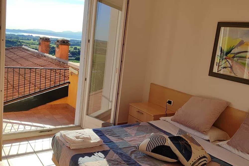 Ganze Wohnung, Schöne Wohnung mit Seeblick, kostenloser Parkplatz und Garten für Ihre Haustiere in Pastrengo, Gardasee-Berge