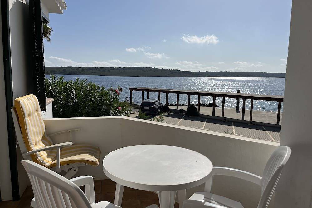 Entire apartment, Very front line stunning sea views near the beach in Fornells, Es Mercadal