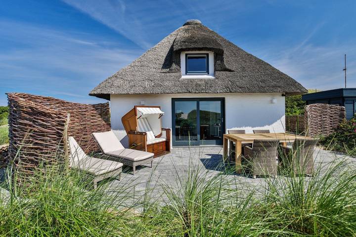 Ferienhaus mit Meerblick für 2 Personen, mit Sauna und Ausblick sowie Garten, mit Haustier an der Nordsee