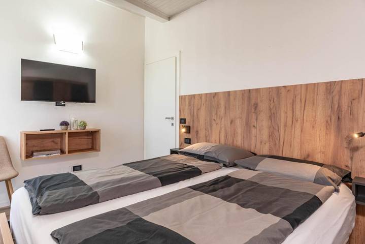 Appartamento per 5 persone, con giardino e panorama, adatto a famiglie con bambini ad Andalo