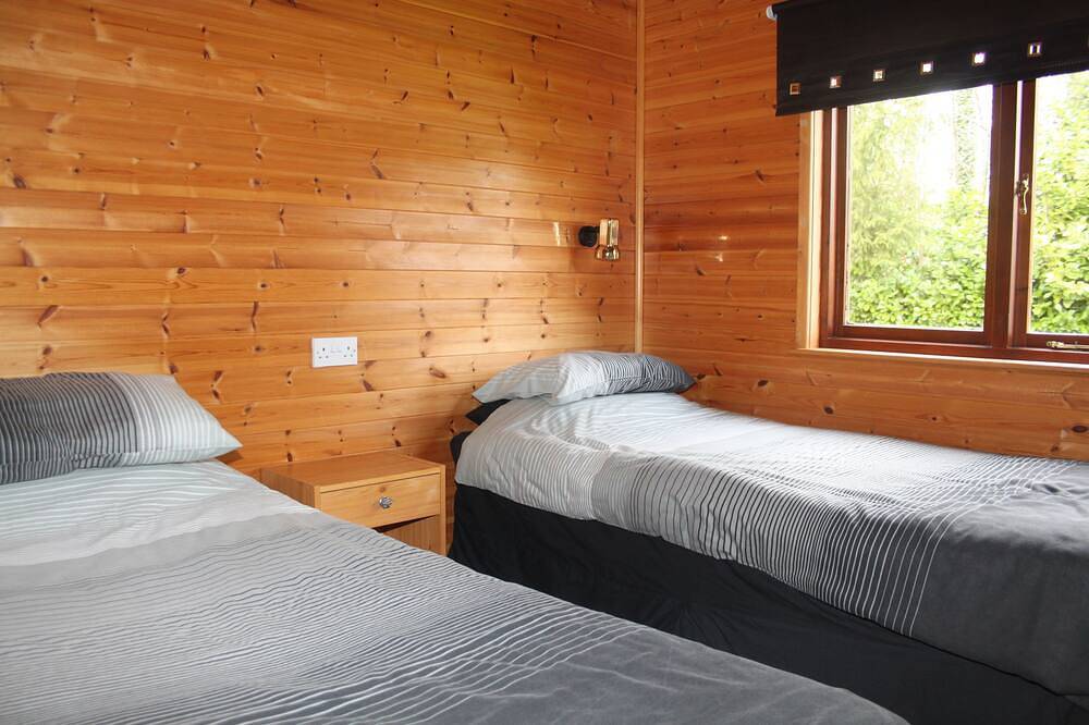 Lac Lucie chalet and private lake, hot tub, private pool, woodland and wildlife in Massignac, Charente