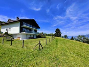 Gîte pour 4 personnes, avec vue sur le lac ainsi que vue et terrasse à Krattigen