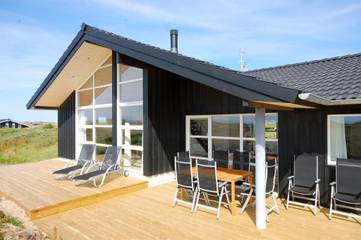 Ferienhaus für 8 Personen, mit Sauna und Terrasse sowie Whirlpool in Nørlev Strand