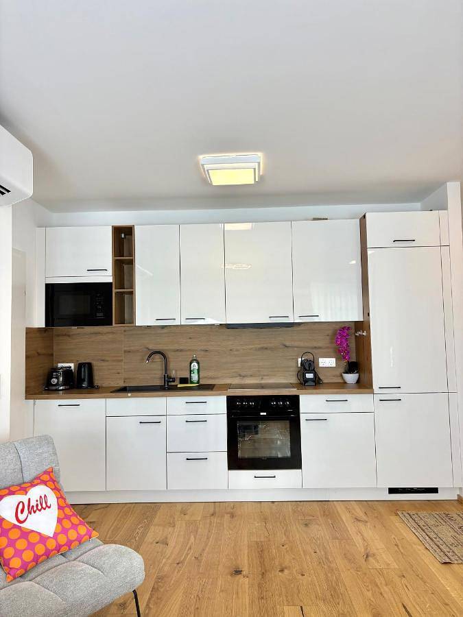 Ferienwohnung für 4 Personen, mit Balkon und Terrasse sowie Garten und Pool