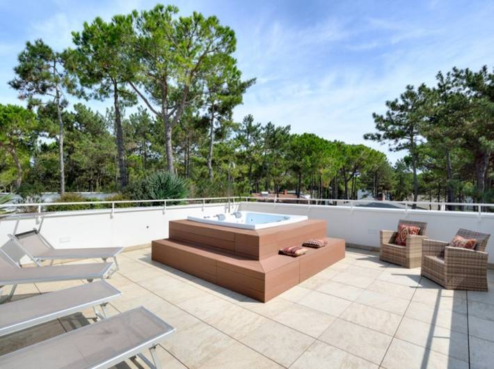 Attico per 8 persone, con idromassaggio e giardino a Lignano Sabbiadoro