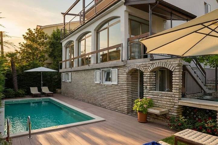 Ferienhaus für 8 Personen, mit Balkon und Garten