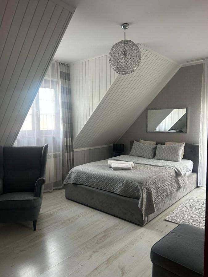 Apartament wakacyjny dla 2 osób, z Balkon i Taras oraz Jacuzzi i Ogród w Mikołajki